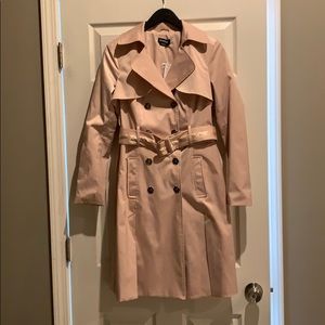 Bebe trench coat in light dusty rose color.